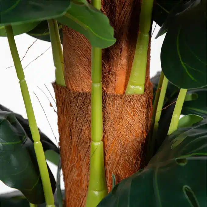 Faux Monstera plant, over 1.8 meters tall for impactful room enhancement.