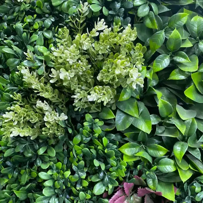 Detailed craftsmanship in faux plant leaf arrangement close up