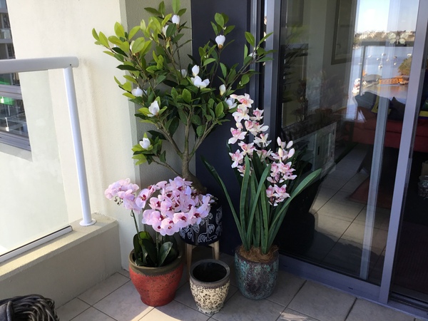 outdoor pots with faux flowers