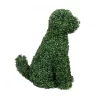 Side view of a topiary dog sculpture made from lush green leaves. Ideal for enhancing garden aesthetics with its lifelike and detailed design