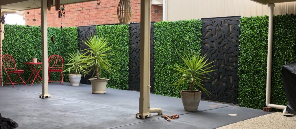 artificial plants on backyard patio