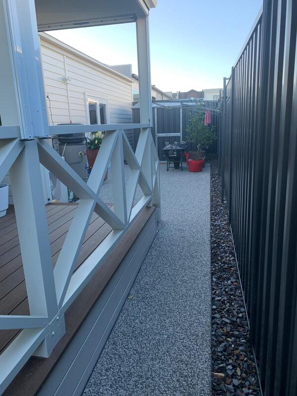garden stakes on fence