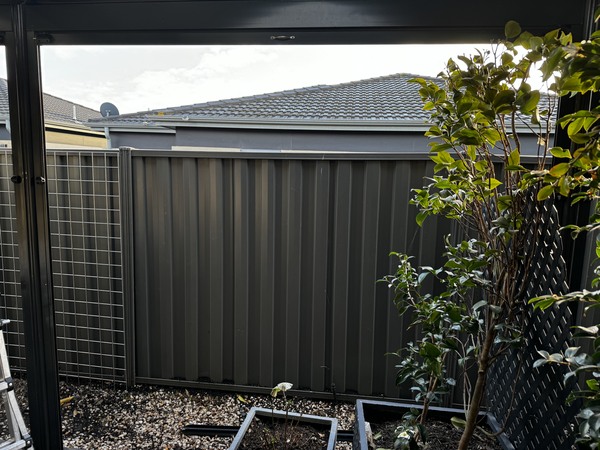 attaching mesh panels to fence