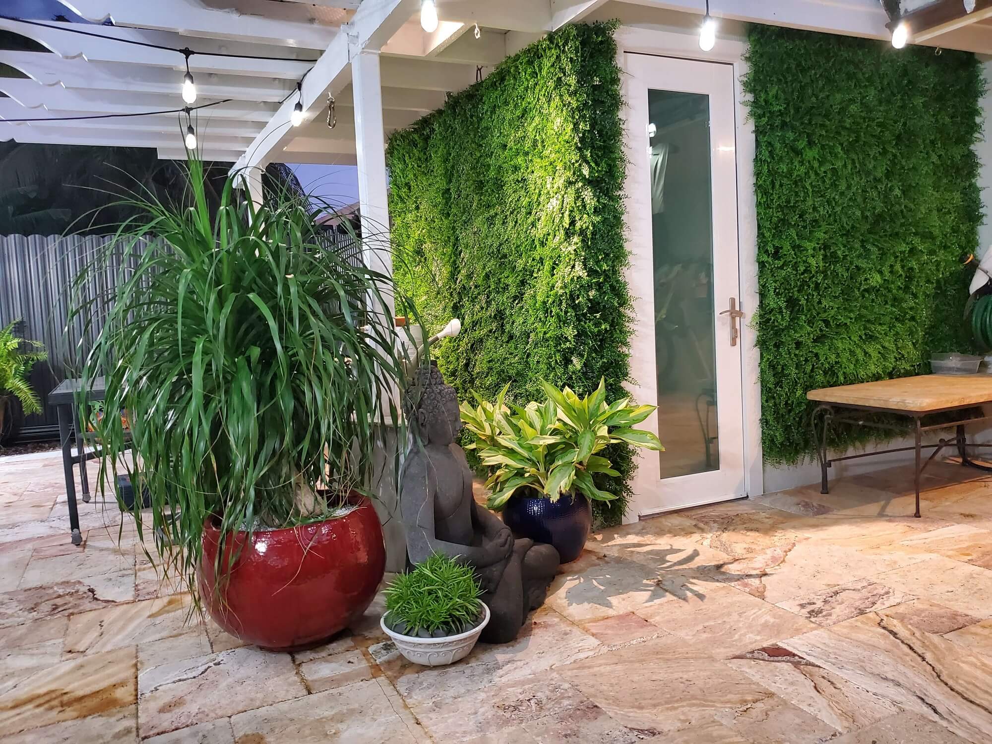 Fern Artificial Green Wall Panel Installed onto a back wall