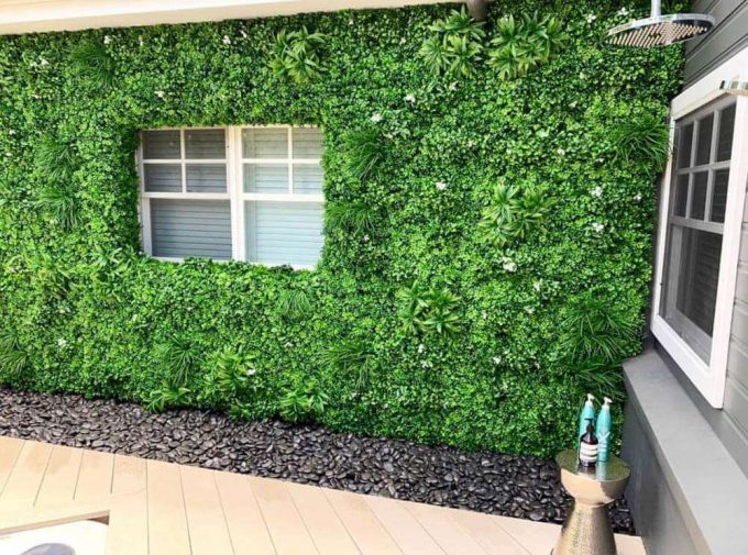 External wall covered in white oasis green wall panels