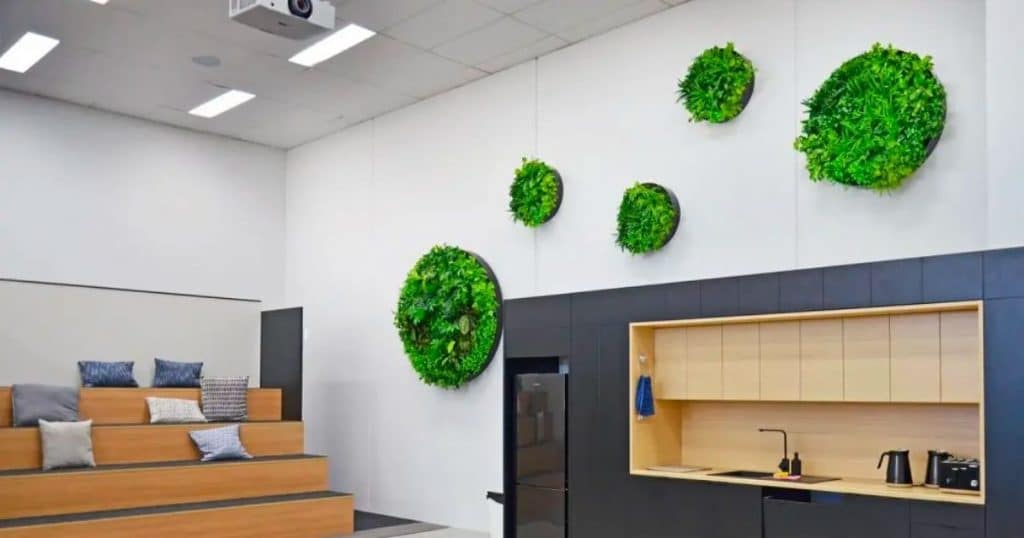 One Agency Green Wall Disks in training centre wall display commercial project